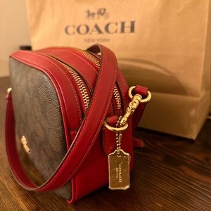 Coach Jes Crossbody in blocked monogram and red leather.